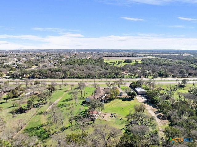 birds eye view of property featuring a rural view