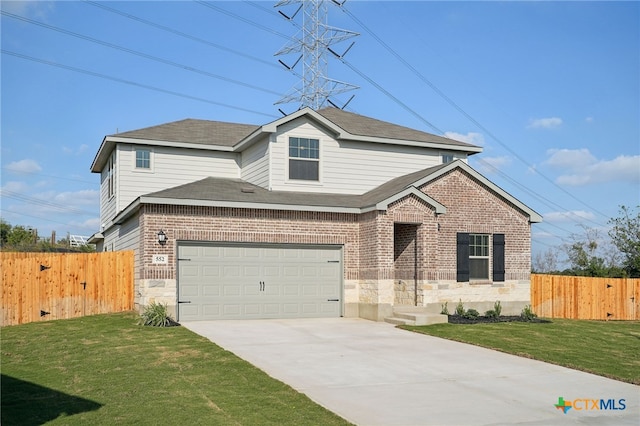 front of property with a garage and a front lawn