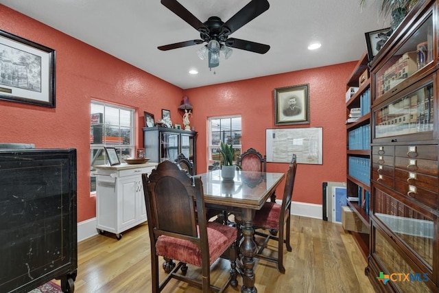 608 S Guadalupe St, San Marcos, TX 78666 - dining room featuring a textured wall, light wood-style floors, ceiling fan, and recessed lighting