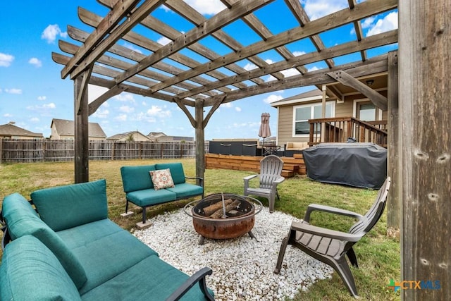 view of patio featuring area for grilling, an outdoor living space with a fire pit, a fenced backyard, and a pergola