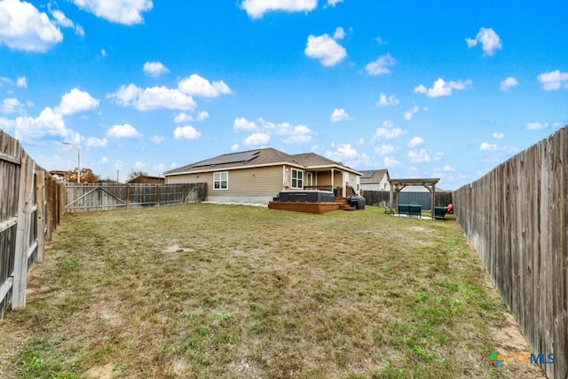 view of yard with a fenced backyard and a wooden deck