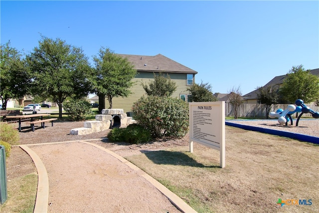 surrounding community featuring a playground