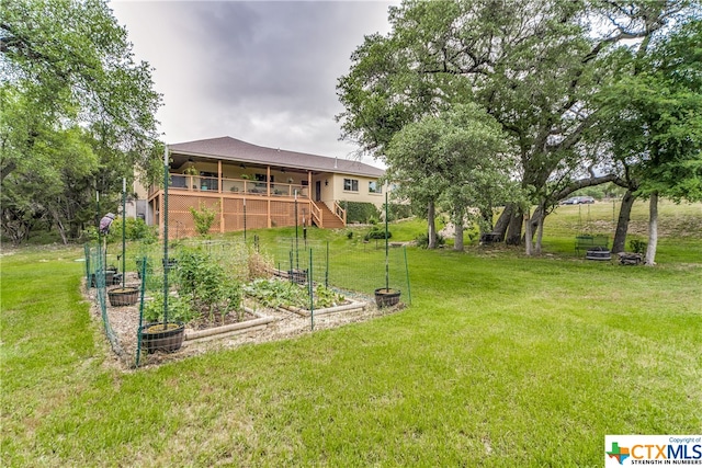 view of yard with a deck