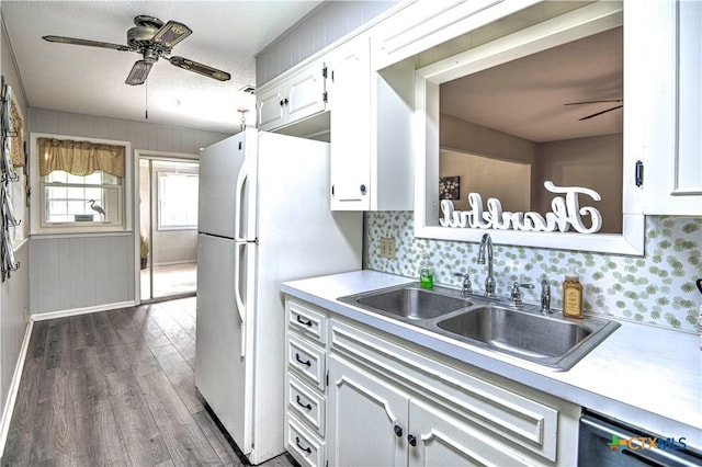 4508 Briar Cliff Rd, Temple, TX 76502 - kitchen featuring a ceiling fan, a sink, light countertops, and white cabinetry