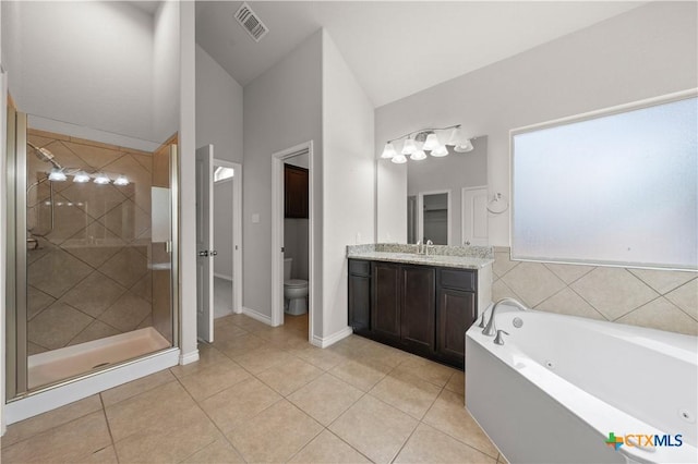 5208 Siltstone Loop, Killeen, TX 76542 - bathroom featuring a shower stall, tile patterned floors, vanity, toilet, and a whirlpool tub