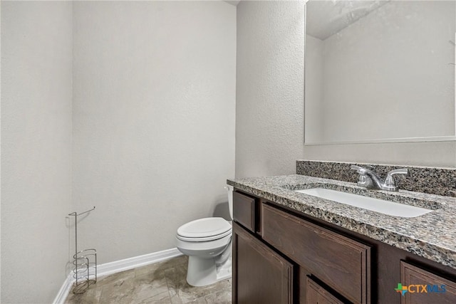 606 Hobby Rd, Copperas Cove, TX 76522 - half bath with baseboards, toilet, and vanity