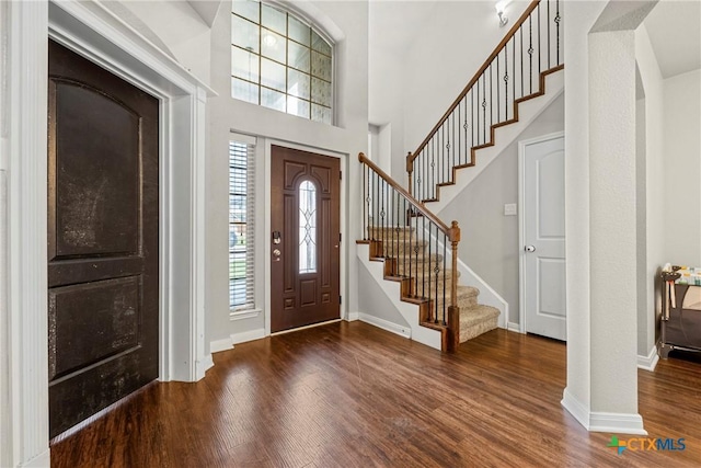606 Hobby Rd, Copperas Cove, TX 76522 - foyer entrance with stairs, plenty of natural light, wood finished floors, and a high ceiling