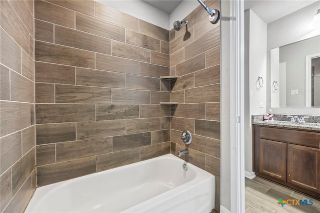 606 Hobby Rd, Copperas Cove, TX 76522 - bathroom featuring shower / bathtub combination and vanity