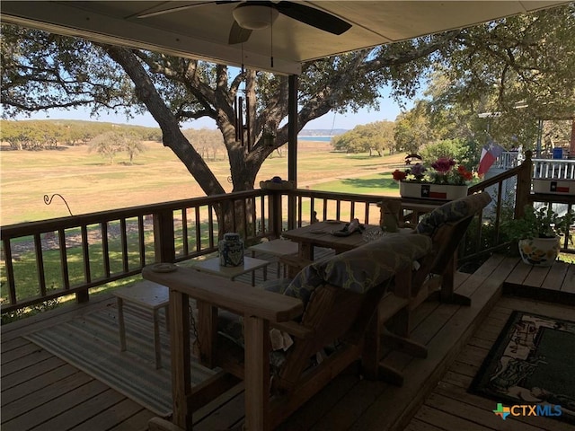 deck featuring a ceiling fan