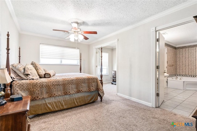 carpeted bedroom featuring connected bathroom, baseboards, ornamental molding, tile patterned floors, and a textured ceiling