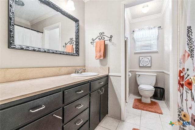 bathroom with vanity, tile patterned floors, toilet, and ornamental molding