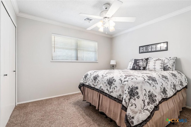 bedroom with visible vents, ornamental molding, a ceiling fan, carpet floors, and baseboards