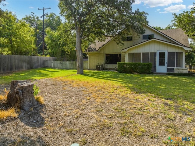 view of yard with fence