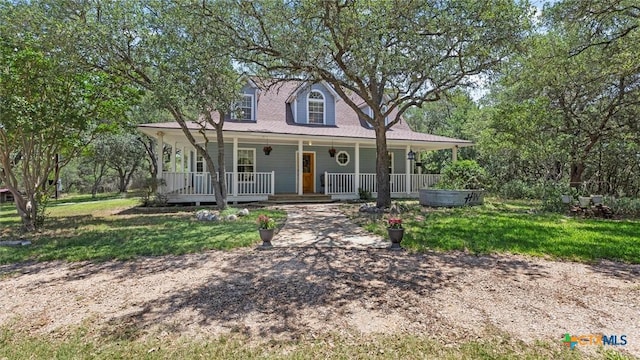 689 Abels Way, Canyon Lake, TX 78133 - view of front of property featuring covered porch and a front yard
