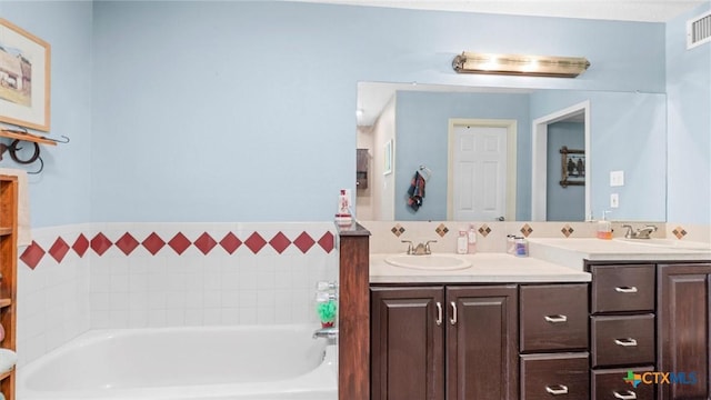 689 Abels Way, Canyon Lake, TX 78133 - full bathroom featuring double vanity and a bath