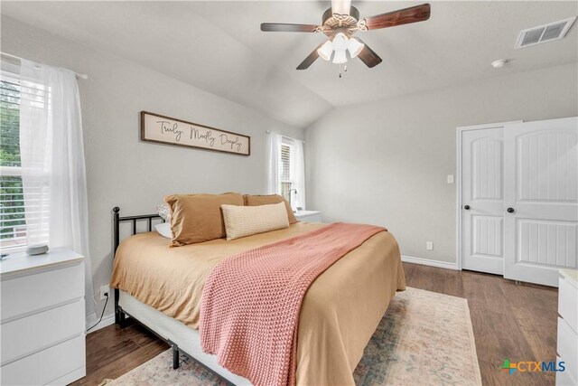 6402 Castle Gap Dr, Killeen, TX 76549 - bedroom with wood finished floors, lofted ceiling, baseboards, and ceiling fan