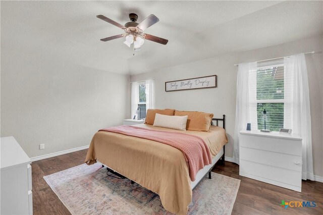 6402 Castle Gap Dr, Killeen, TX 76549 - bedroom with baseboards, wood finished floors, and a ceiling fan