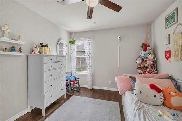 6402 Castle Gap Dr, Killeen, TX 76549 - bedroom featuring wood finished floors, baseboards, and ceiling fan