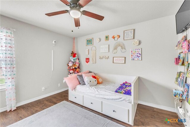6402 Castle Gap Dr, Killeen, TX 76549 - bedroom with wood finished floors, baseboards, and ceiling fan
