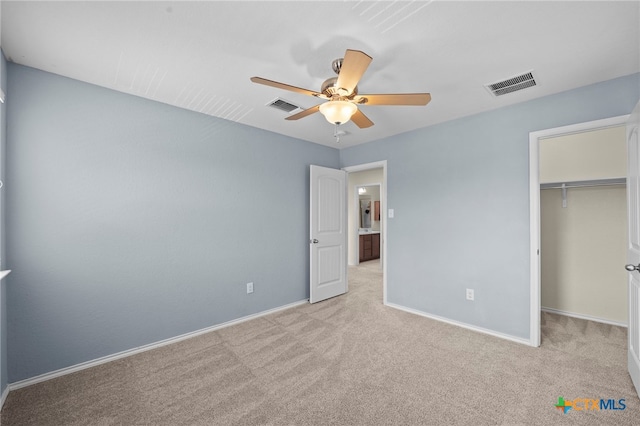 220 Hinge Crk, Cibolo, TX 78108 - unfurnished bedroom with carpet flooring, baseboards, a closet, a spacious closet, and ceiling fan