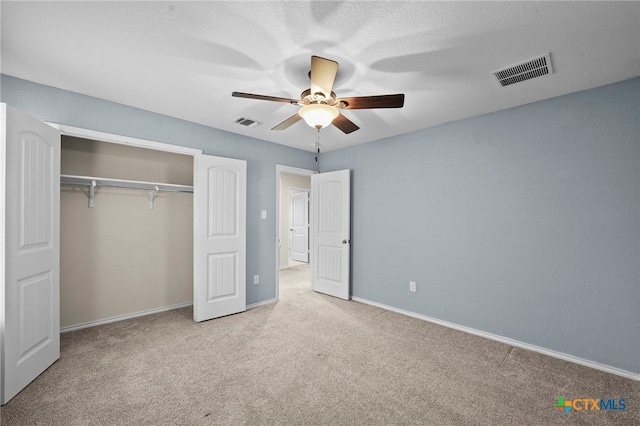 220 Hinge Crk, Cibolo, TX 78108 - unfurnished bedroom with carpet flooring, a closet, baseboards, and a ceiling fan
