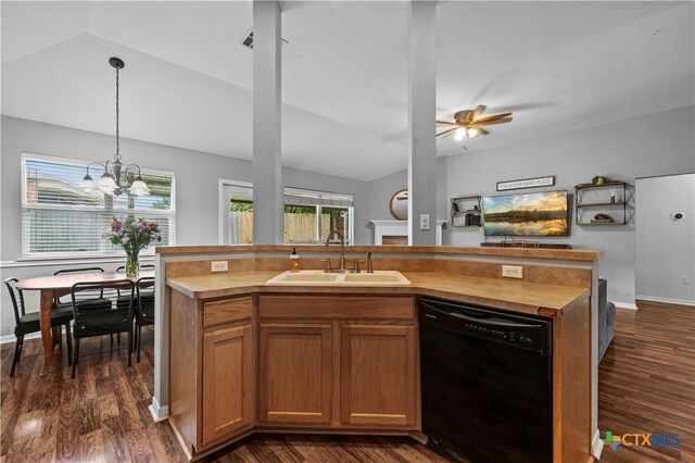 7317 Galleta Ct, Temple, TX 76502 - kitchen featuring black dishwasher, a sink, lofted ceiling, dark wood-type flooring, and decorative light fixtures
