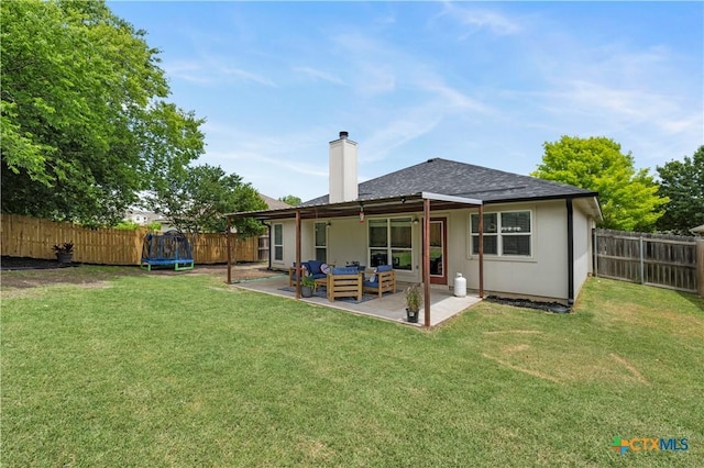 7317 Galleta Ct, Temple, TX 76502 - rear view of property featuring a chimney, a patio area, a trampoline, and an outdoor hangout area