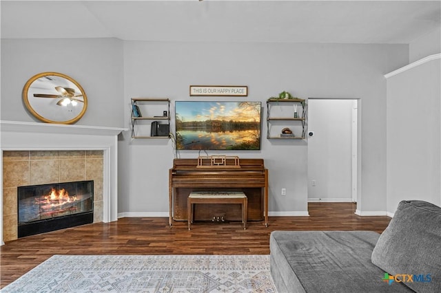 7317 Galleta Ct, Temple, TX 76502 - living area featuring wood finished floors, a fireplace, and baseboards