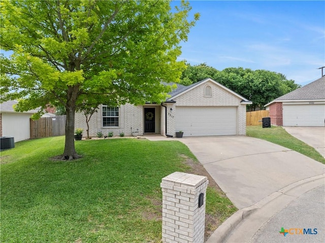 7317 Galleta Ct, Temple, TX 76502 - view of front of property with concrete driveway, an attached garage, brick siding, and cooling unit
