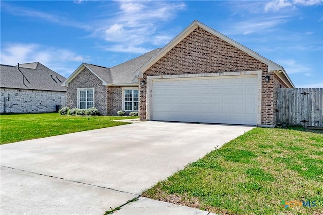 ranch-style home featuring brick siding, a front lawn, fence, a garage, and driveway