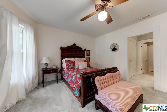 carpeted bedroom featuring ceiling fan