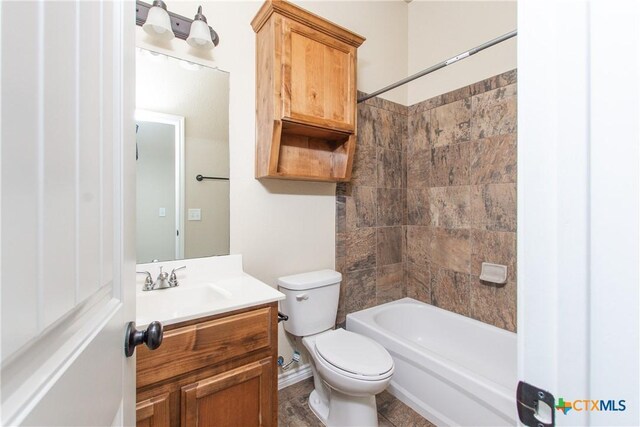 607 Sladecek Dr, Killeen, TX 76542 - full bath with toilet, vanity, and bathtub / shower combination