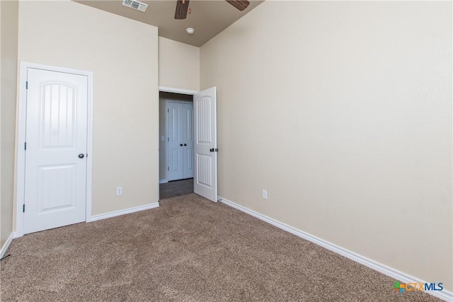 607 Sladecek Dr, Killeen, TX 76542 - unfurnished bedroom with carpet, baseboards, a high ceiling, and a ceiling fan