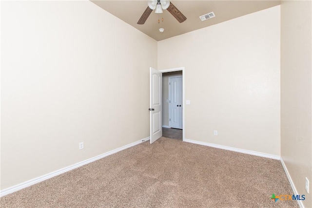 607 Sladecek Dr, Killeen, TX 76542 - empty room with light carpet, a ceiling fan, baseboards, and high vaulted ceiling