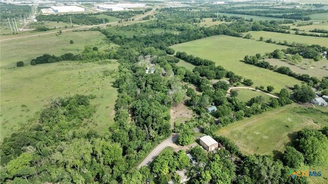 birds eye view of property featuring a rural view