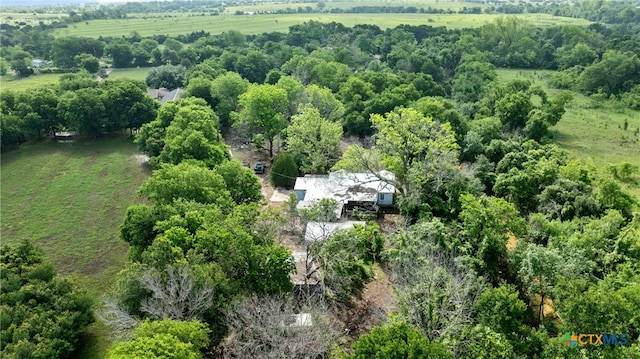 birds eye view of property featuring a rural view