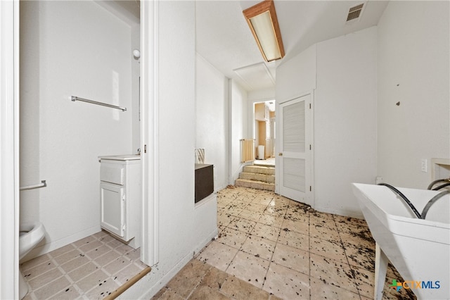 bathroom featuring a bath and vanity