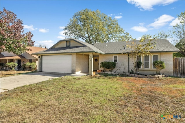 single story home with a garage and a front lawn