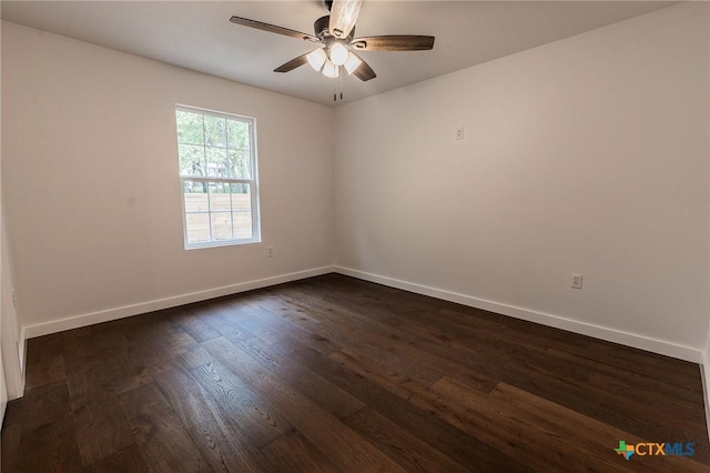 1123 Ainsworth St, Gonzales, TX 78629 - empty room with ceiling fan and dark wood-type flooring