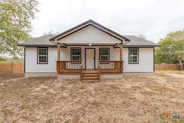 1123 Ainsworth St, Gonzales, TX 78629 - ranch-style home with a porch