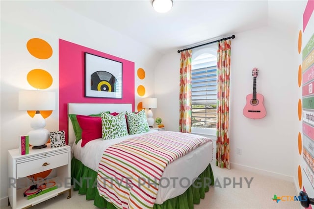 bedroom with carpet flooring and baseboards