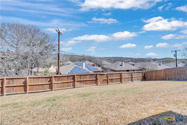 view of yard featuring a fenced backyard