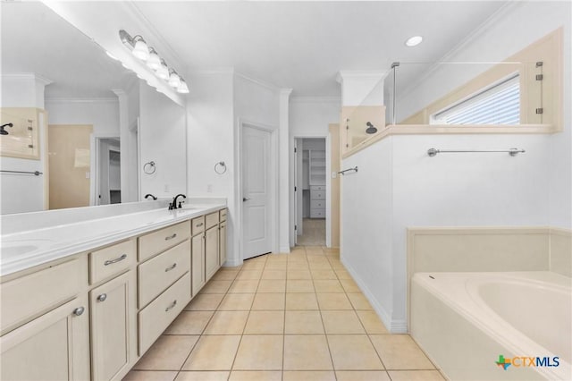 full bath with a garden tub, ornamental molding, a sink, tile patterned flooring, and walk in shower