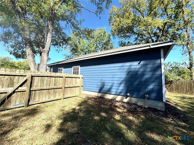 view of property exterior with a yard