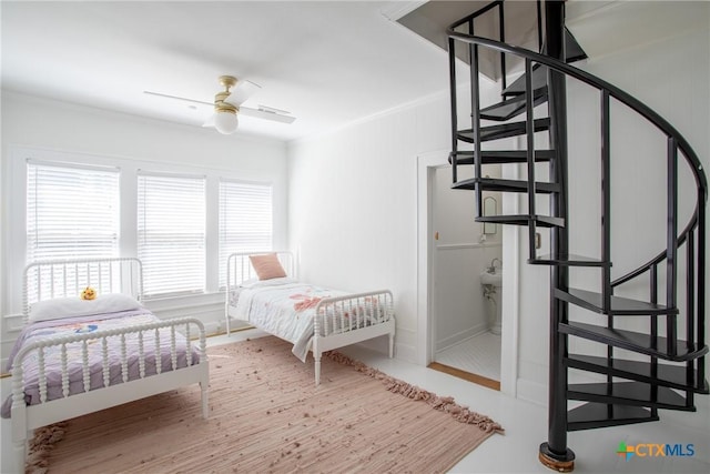 bedroom featuring ceiling fan and ornamental molding