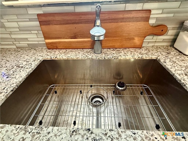 details with light stone counters and sink