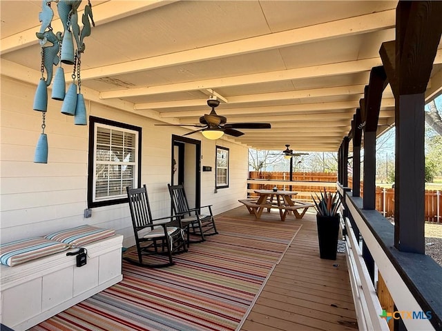 wooden deck with ceiling fan