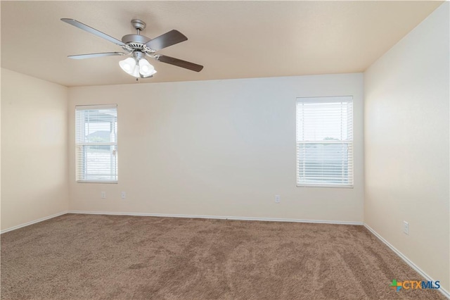 5305 Eagles Nest Dr, Killeen, TX 76549 - unfurnished room with light colored carpet and a ceiling fan