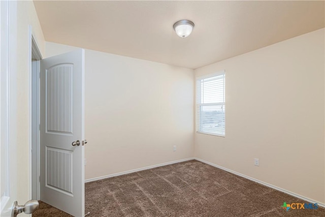 5305 Eagles Nest Dr, Killeen, TX 76549 - spare room featuring dark colored carpet