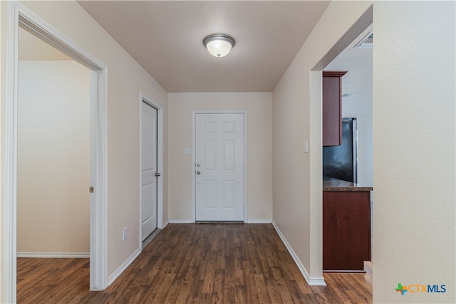 hall featuring dark hardwood / wood-style flooring